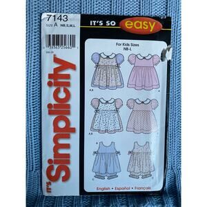 Simplicity 7143 Sewing pattern Baby dress jumper bloomers puff sleeve size NB-L
